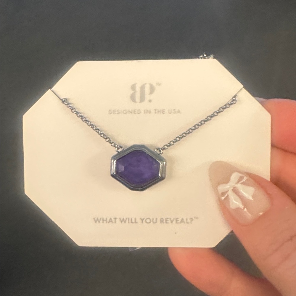 “Laced with Distant Fire”
Lab created amethyst fused with genuine quartz